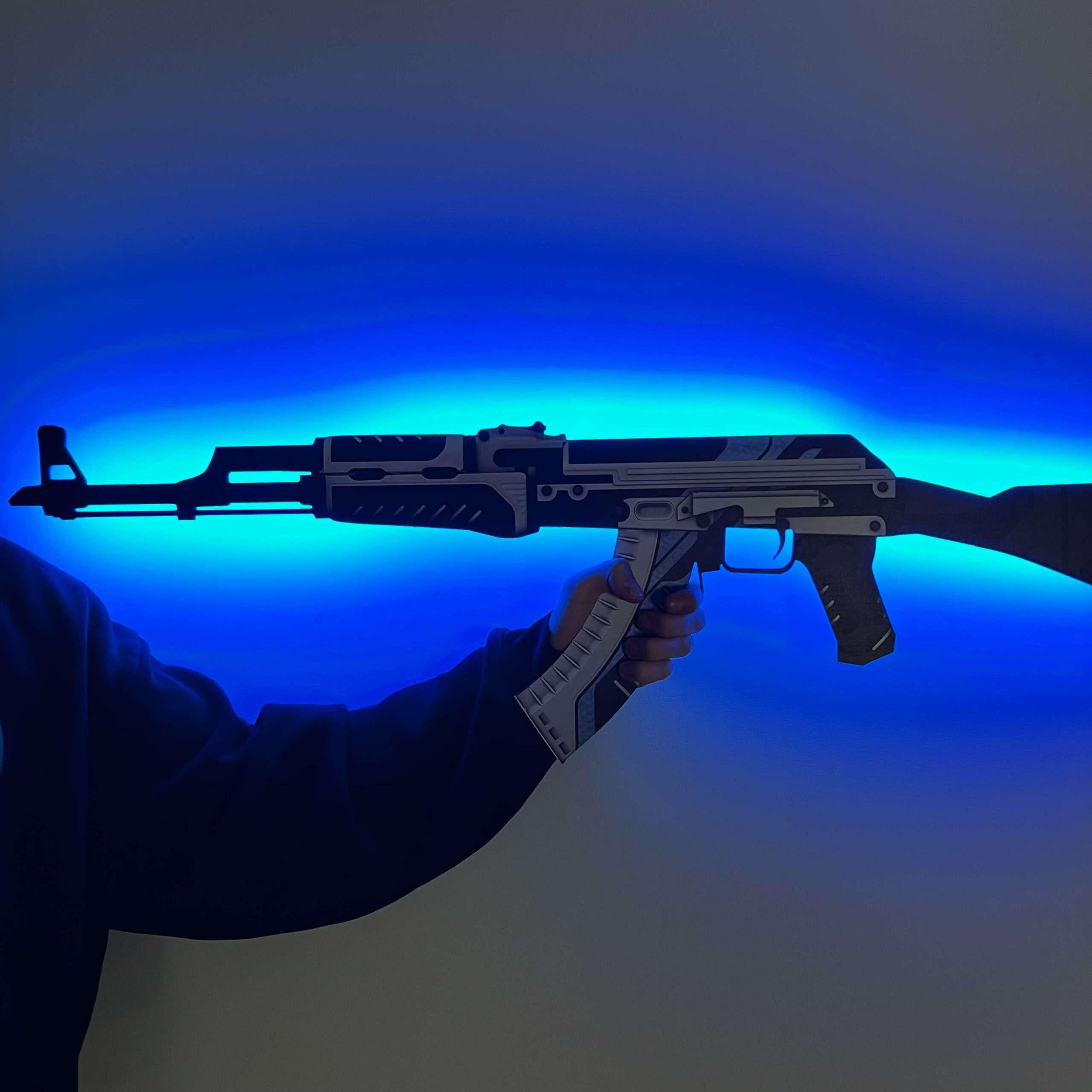 Greencade's Vulcan AK-47 RGB wall piece, lit from behind
